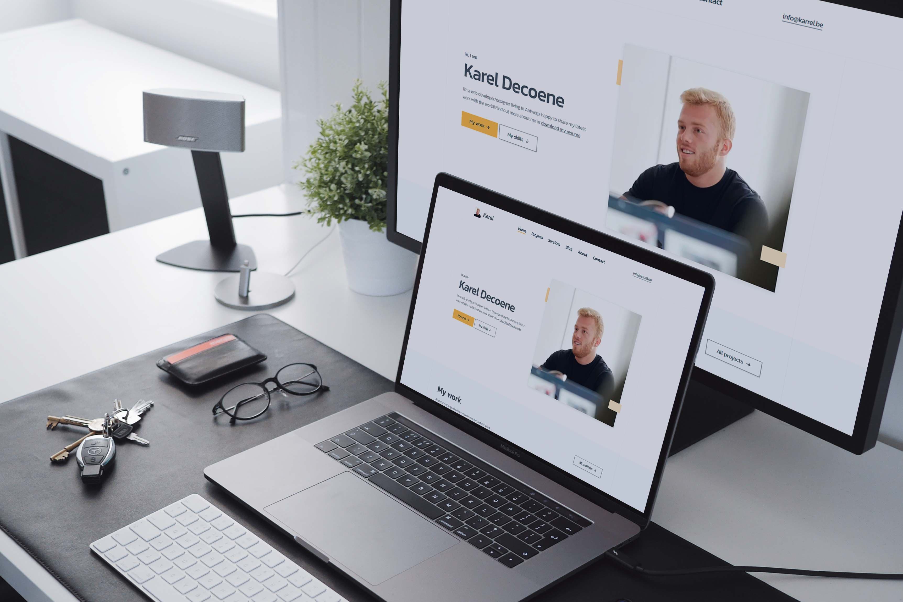 Karel Decoene portfolio on Macbook and iMac on desk